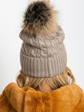 Cozy Winter Hat with Wide Cuff and Fluffy Pom-Pom